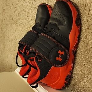 Red and Black UA sneakers